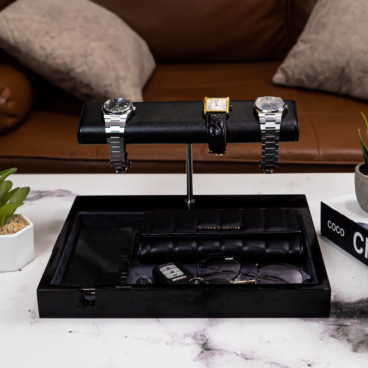 The LWR Watch Stand x Valet Tray on a marble table with three watches, wallet, keys and glasses