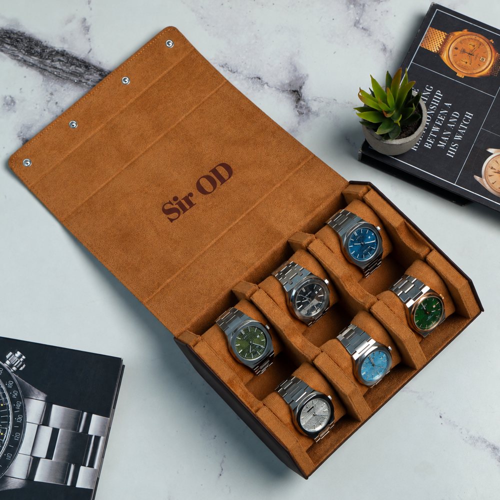Orange LWR 6-slot watch roll open with six watches and the name the name engraved inside
